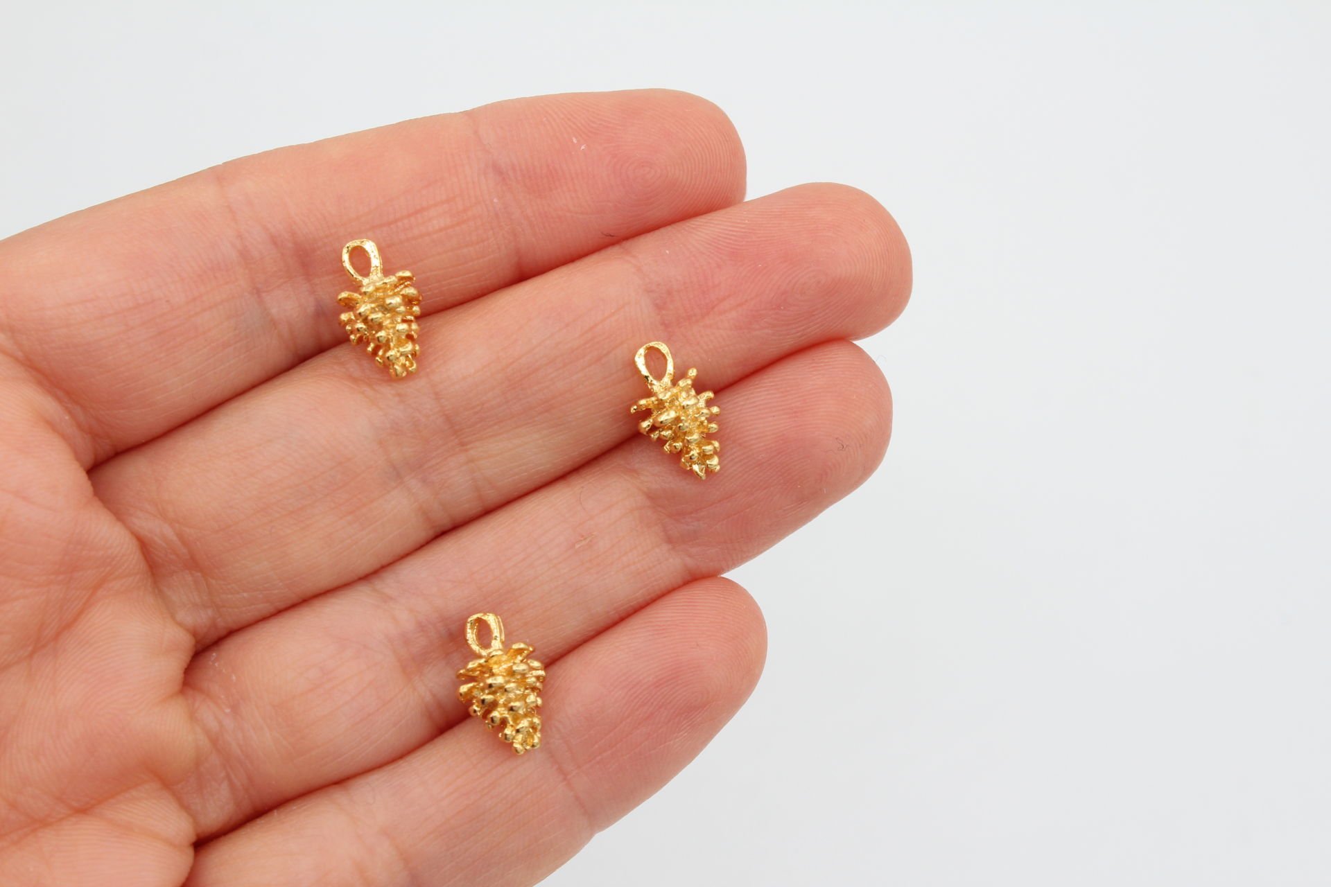 Altın Kap. Yılbaşı Kozalak