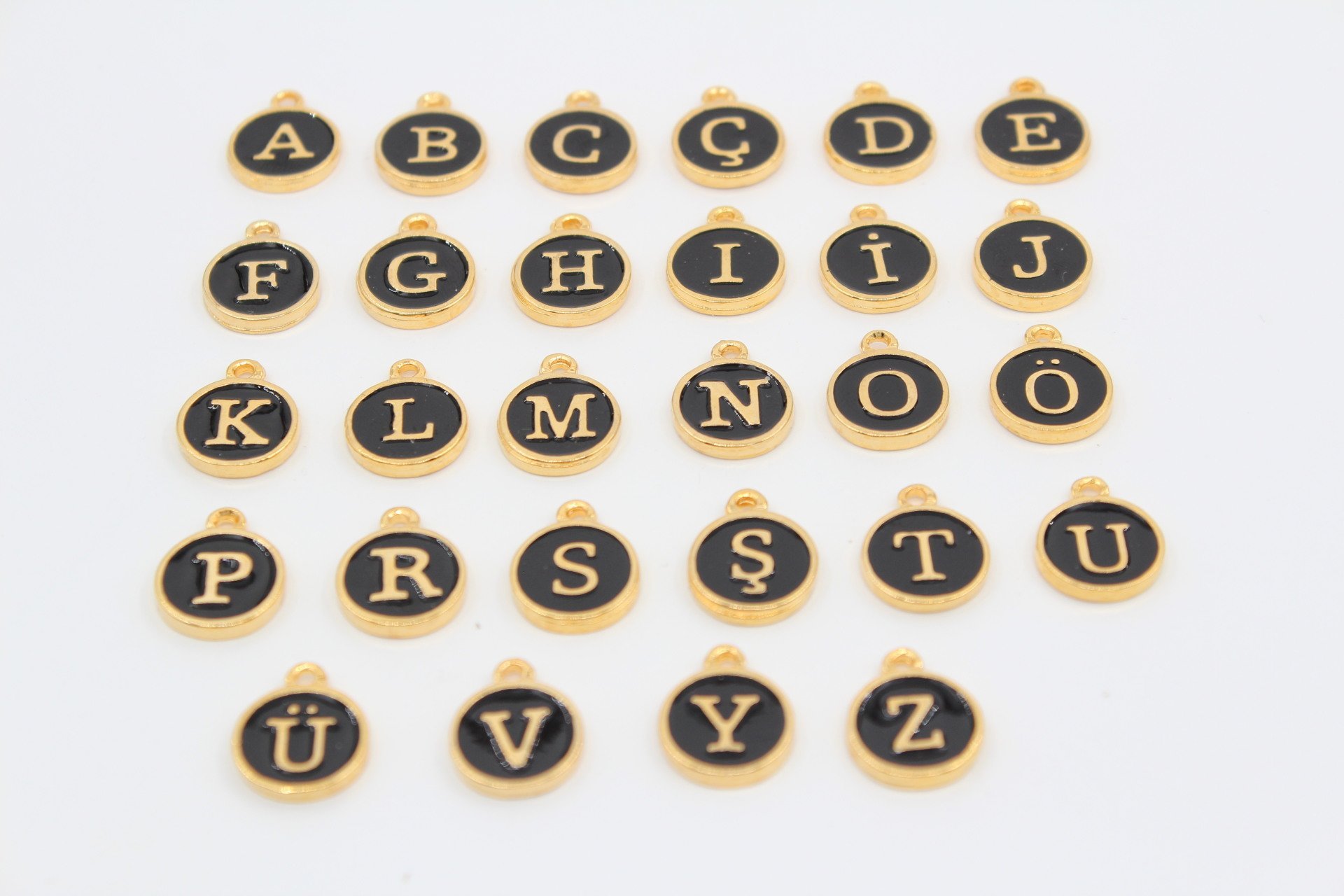 Altın Kap. Siyah Mineli Harf