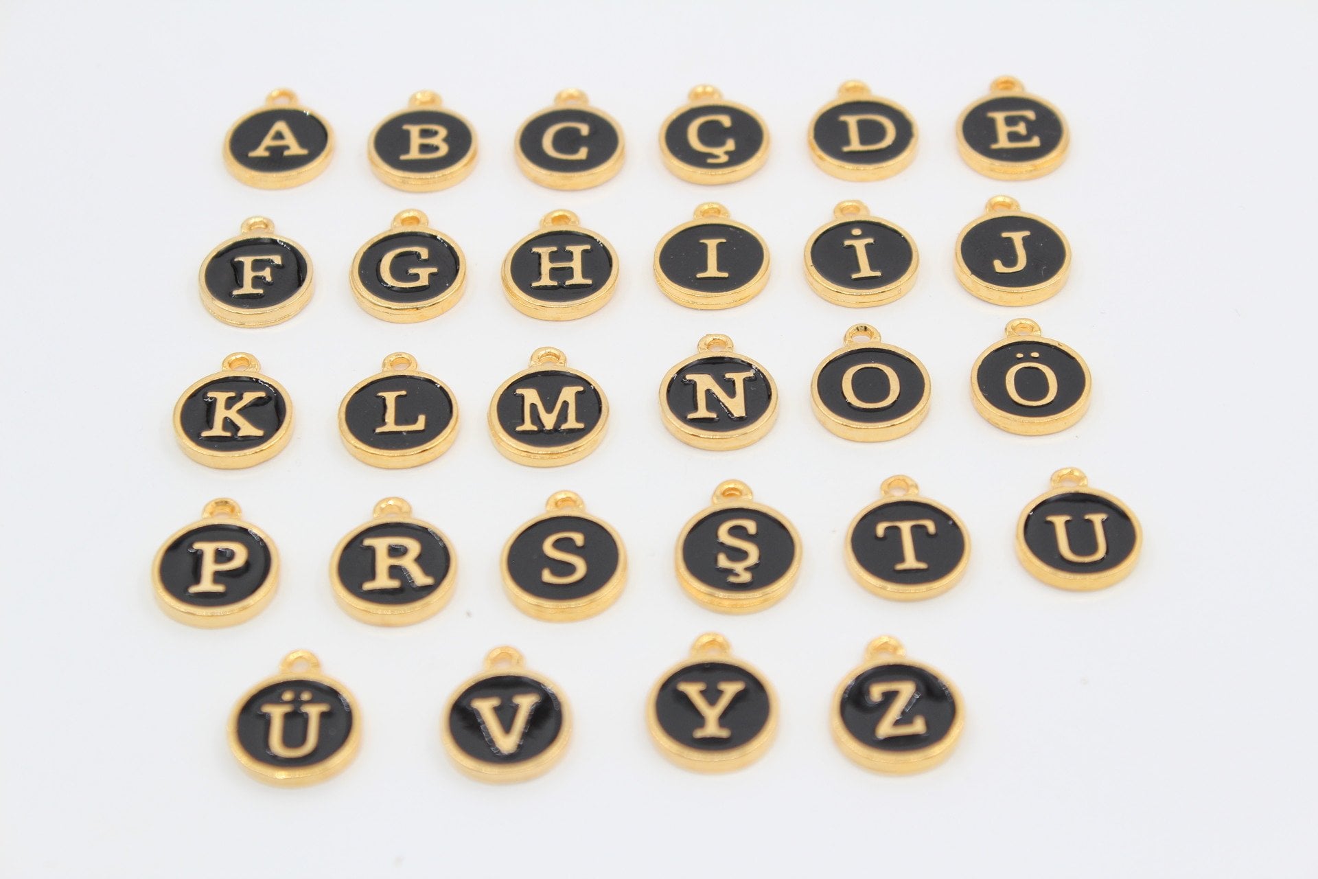 Altın Kap. Siyah Mineli Harf